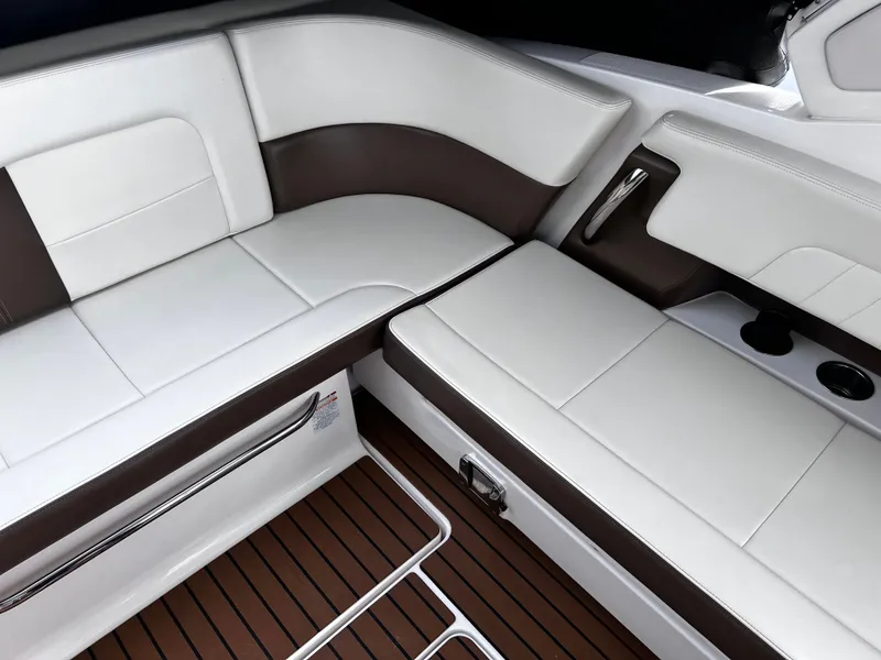 Slide: The Image of Interior of 2017 Chaparral 337 SSX with white and brown seating. - 14