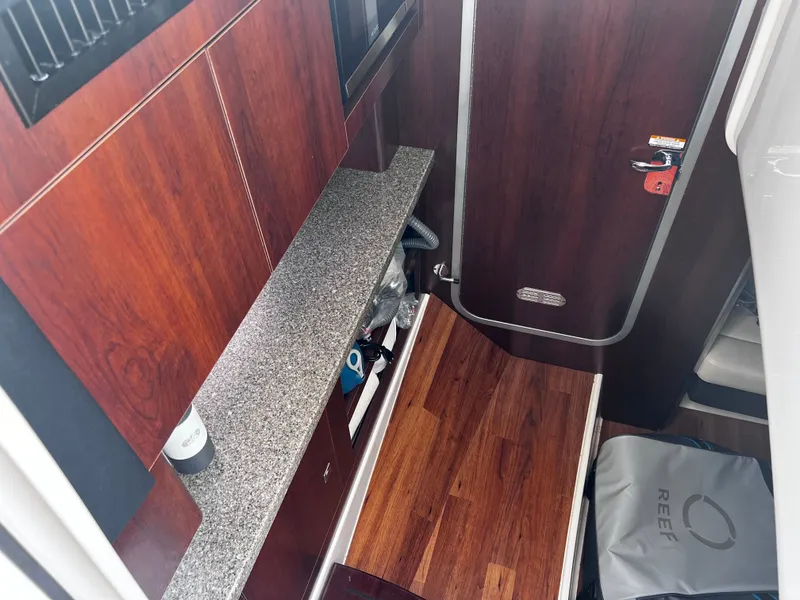 Slide: The Image of Interior of 2017 Chaparral 337 SSX with wood paneling. - 32