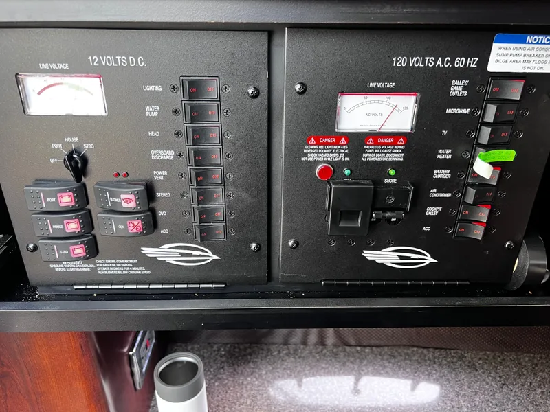 Slide: The Image of Control panel of 2017 Chaparral 337 SSX with 12V and 120V displays. - 33