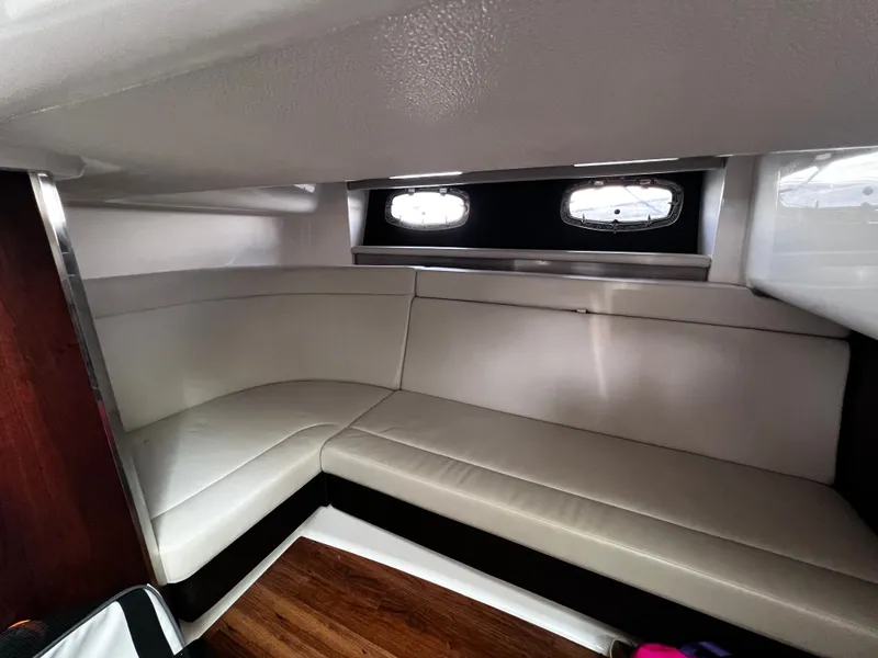Slide: The Image of Interior of 2017 Chaparral 337 SSX with white leather sofa. - 36