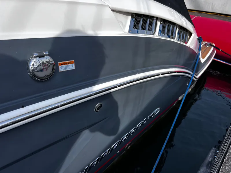 Slide: The Image of 2017 Chaparral 337 SSX boat docked at marina. - 42