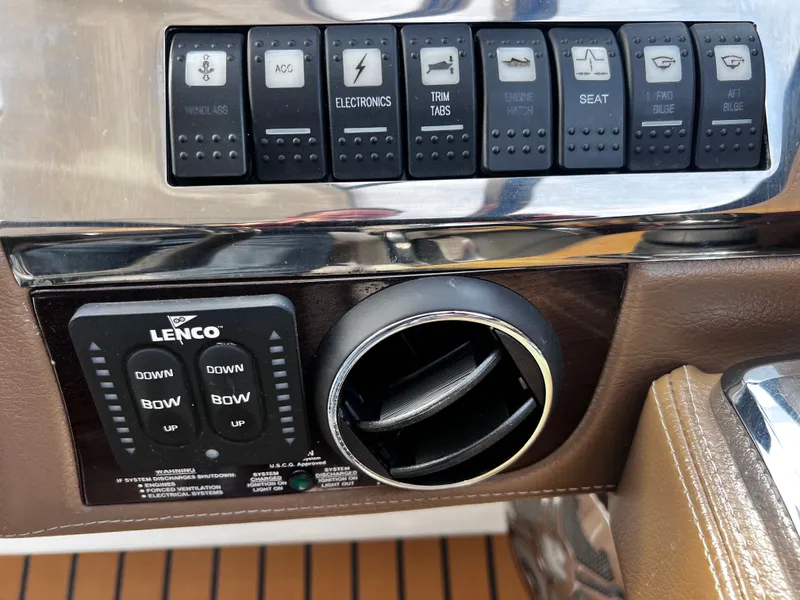 Slide: The Image of 2017 Chaparral 337 SSX control panel with switches and vent. - 47