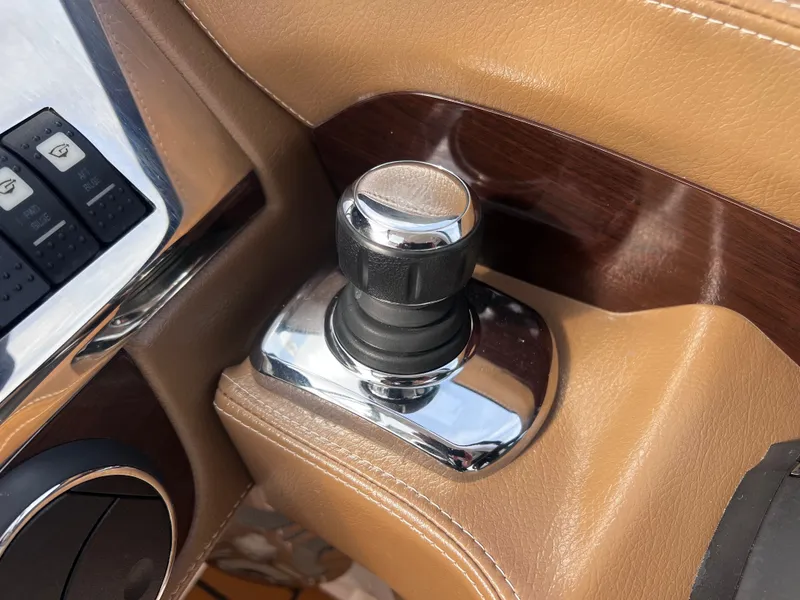 Slide: The Image of Joystick control in the cockpit of a 2017 Chaparral 337 SSX boat. - 7