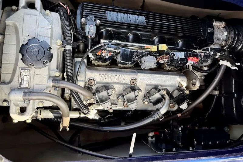 Slide: The Image of Engine of 2015 Yamaha WaveRunner VX Cruiser, showcasing intricate components and wiring. - 23