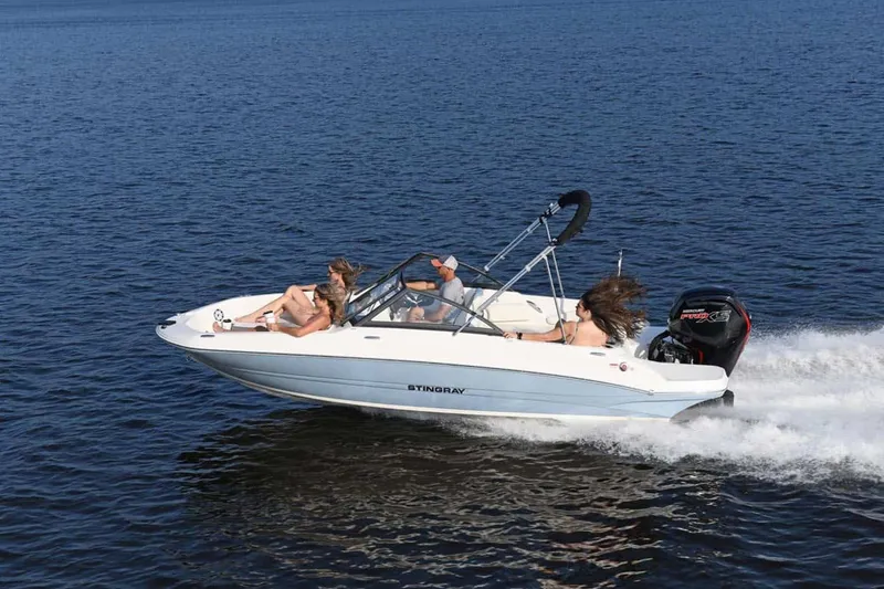 Slide: The Image of Stingray 191 DC 2025 boat cruising on water with passengers. - 12