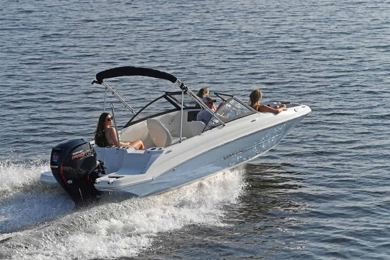 Slide: The Image of Stingray 191 DC 2025 boat on water with passengers. - 16