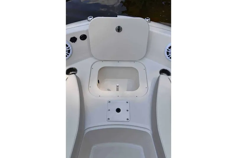 Slide: The Image of Interior view of 2025 Stingray 191 DC boat with storage compartment. - 6