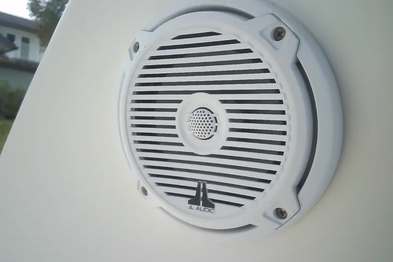 Slide: The Image of White JL Audio speaker on 2005 Sea Ray 300 Sundancer boat. - 42