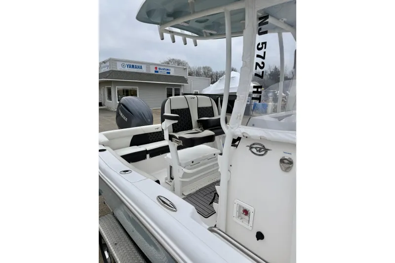 Slide: The Image of 2023 Tidewater 220 LXF boat with Yamaha engine at dealership. - 22