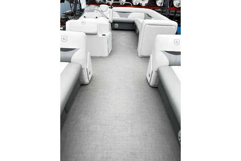 Slide: The Image of 2018 Godfrey Sweetwater 2486 C pontoon boat interior with gray seating and flooring. - 6
