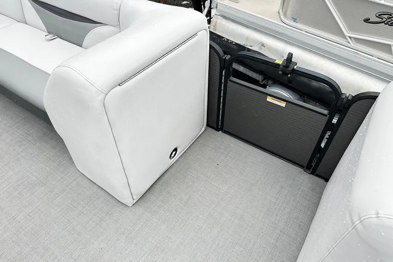 Slide: The Image of Interior of 2018 Godfrey Sweetwater 2486 C pontoon boat, featuring cushioned seating. - 9