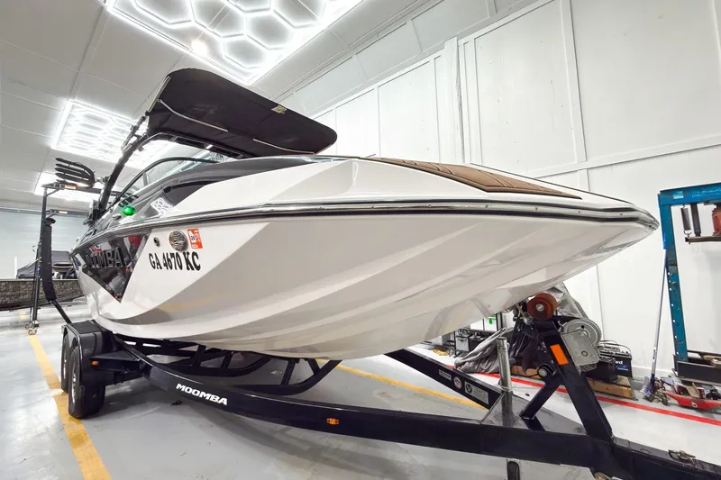 Slide: The Image of 2020 Moomba Kaiyen boat on trailer in a well-lit garage. - 10