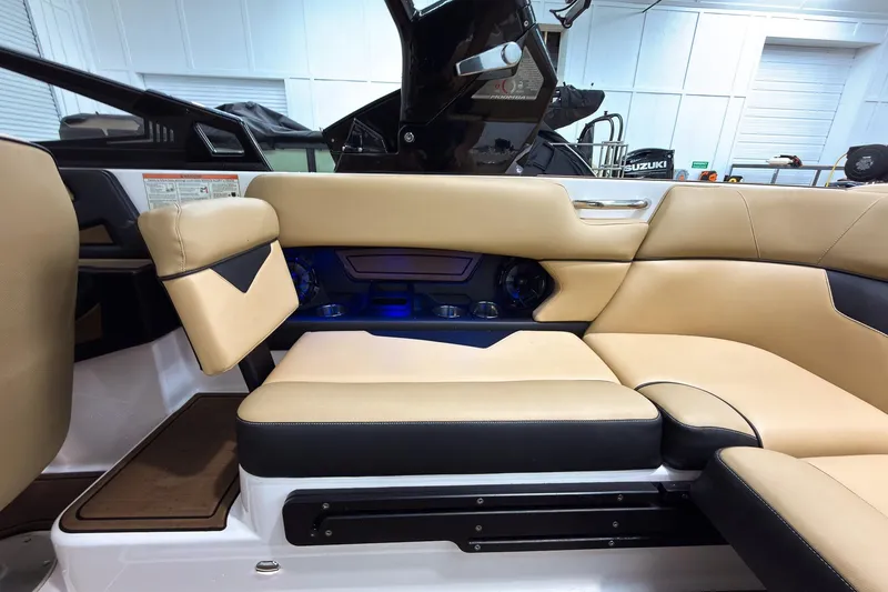 Slide: The Image of 2020 Moomba Kaiyen boat interior with beige seating and modern design. - 23