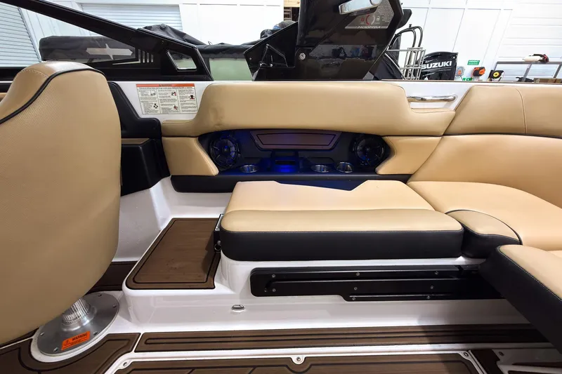Slide: The Image of 2020 Moomba Kaiyen boat interior with beige seating and modern design elements. - 24