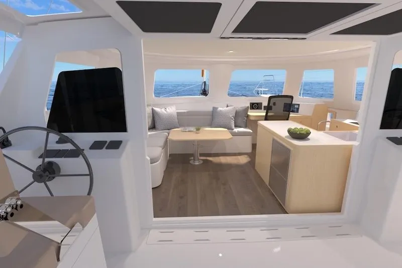 Slide: The Image of 2026 Seawind 1270 yacht interior with modern design, spacious seating, and ocean view. - 13