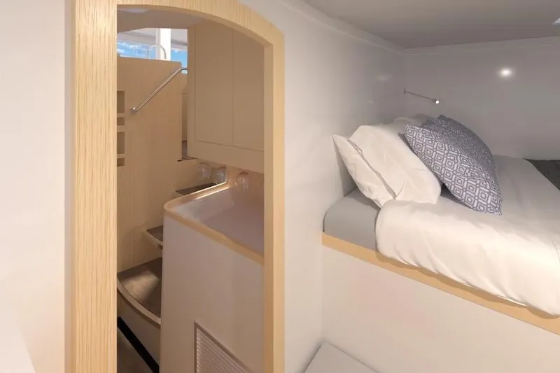 Slide: The Image of Interior of 2026 Seawind 1270 yacht, featuring cozy bedroom and modern bathroom. - 24