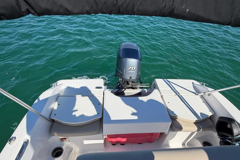 Slide: The Image of 2020 Robalo R160 Center Console boat with Yamaha 70 engine on open water. - 20