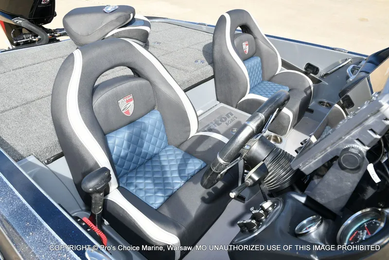 Slide: The Image of Interior of 2022 Triton 19 TRX PATRIOT boat with blue seats. - 38