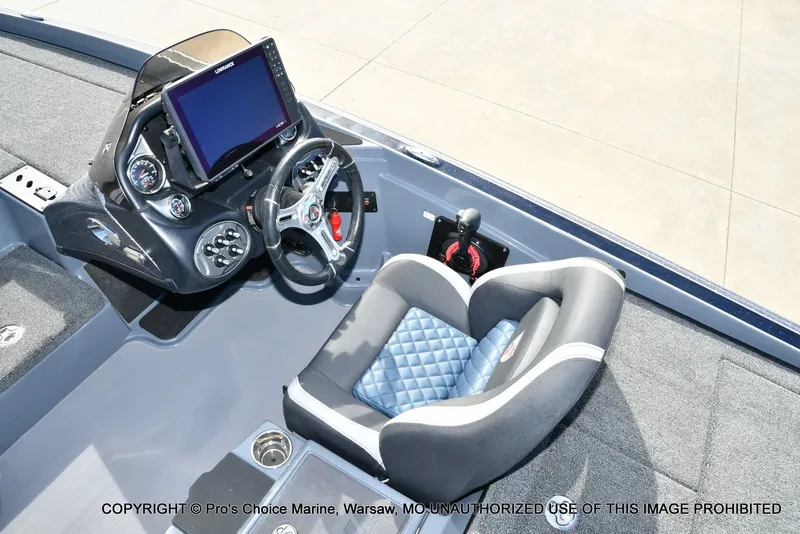Slide: The Image of Interior view of a 2022 Triton 19 TRX PATRIOT boat with helm console. - 45