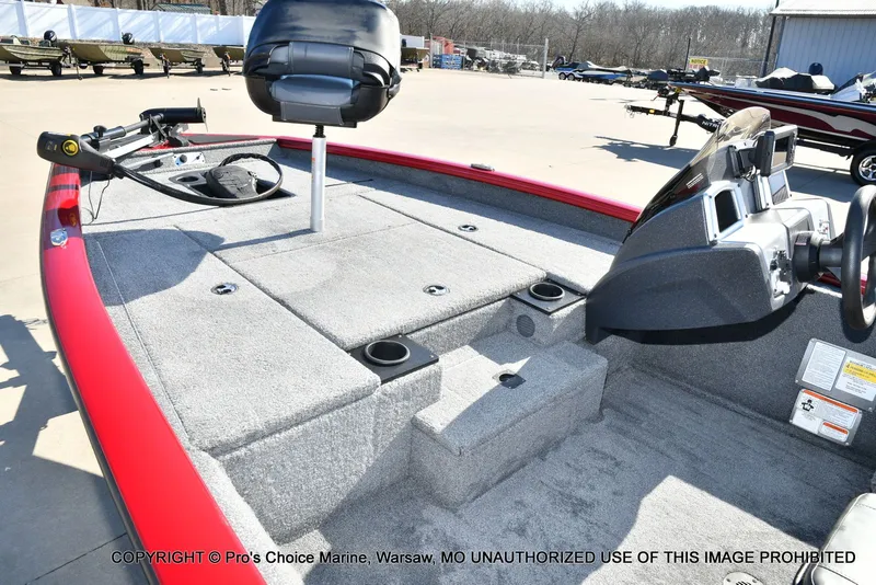 Slide: The Image of 2025 Tracker PRO TEAM 175 boat interior with steering console. - 13
