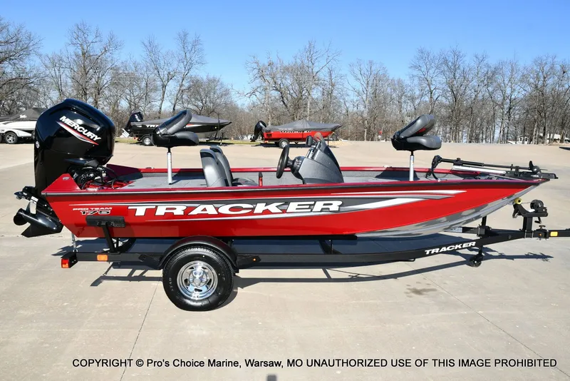 Slide: The Image of Red Tracker PRO TEAM 175 boat, 2025 model, on trailer. - 19