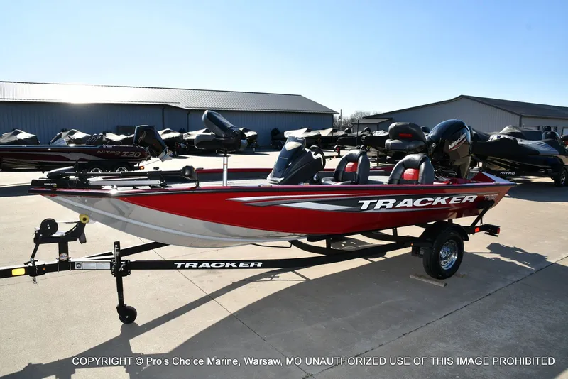 Slide: The Image of 2025 Tracker PRO TEAM 175 boat on trailer outdoors. - 24