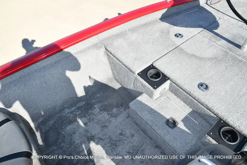 Slide: The Image of Interior of Tracker PRO TEAM 175 boat, gray carpet flooring, 2025 model. - 43