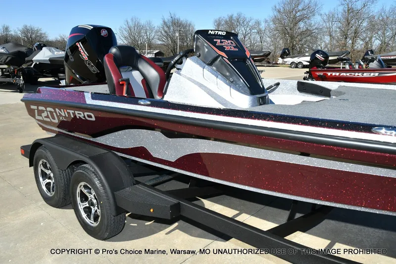 Slide: The Image of 2025 Nitro Z20 XL Pro boat on trailer, shiny red and silver. - 12