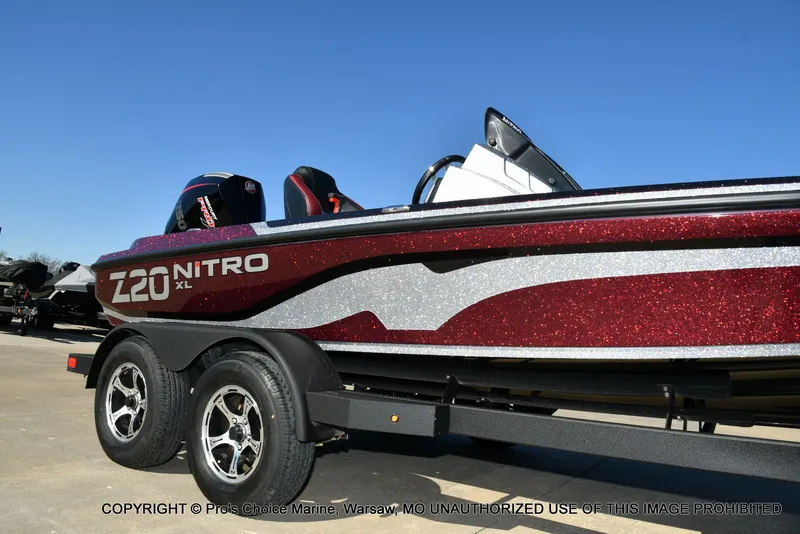 Slide: The Image of 2025 Nitro Z20 XL Pro boat on trailer, sparkling red and silver. - 16