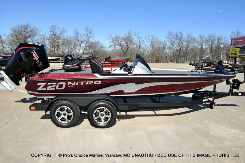 Slide: The Image of 2025 Nitro Z20 XL Pro boat on trailer, side view. - 19