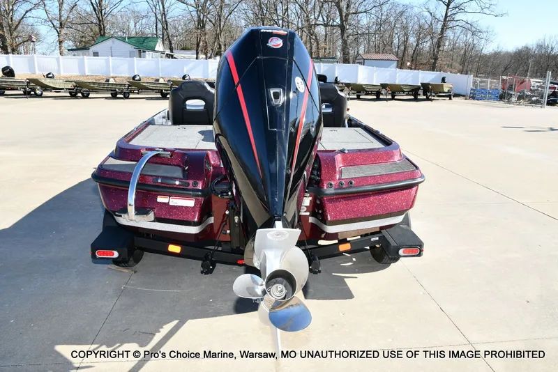 Slide: The Image of 2025 Nitro Z20 XL Pro boat in a parking lot. - 26