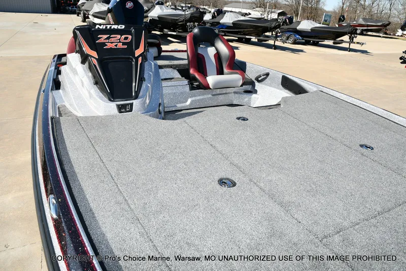 Slide: The Image of 2025 Nitro Z20 XL Pro boat on a parking lot. - 37