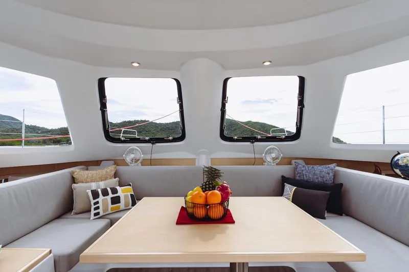 Slide: The Image of Luxurious interior of 2026 Seawind 1160XL yacht with panoramic windows and elegant seating. - 11