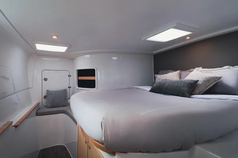 Slide: The Image of Luxurious cabin interior of 2026 Seawind 1160XL catamaran with cozy bedding and modern design. - 17