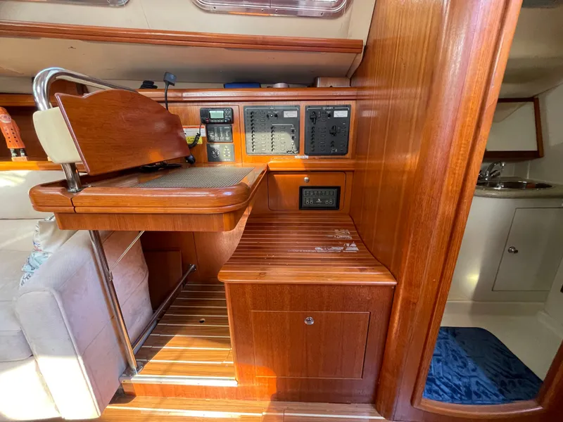 Slide: The Image of Interior of 2007 Hunter 41 sailboat with wooden cabinetry. - 20