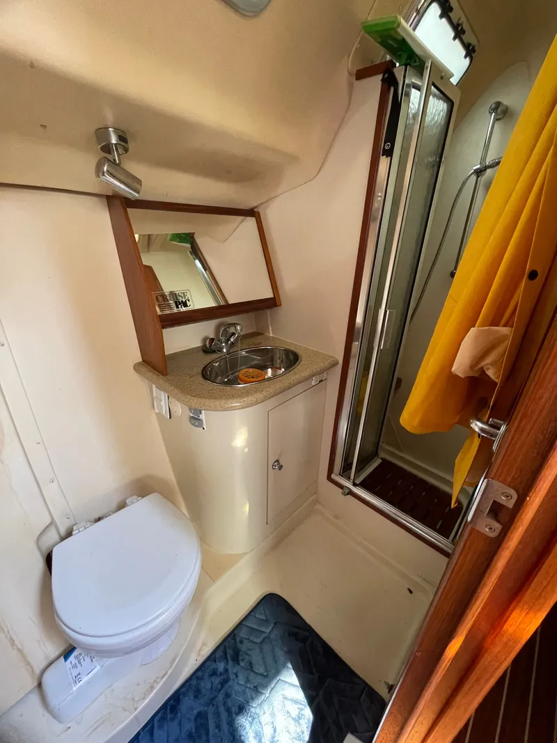 Slide: The Image of Bathroom of a 2007 Hunter 41 yacht with shower and sink. - 29