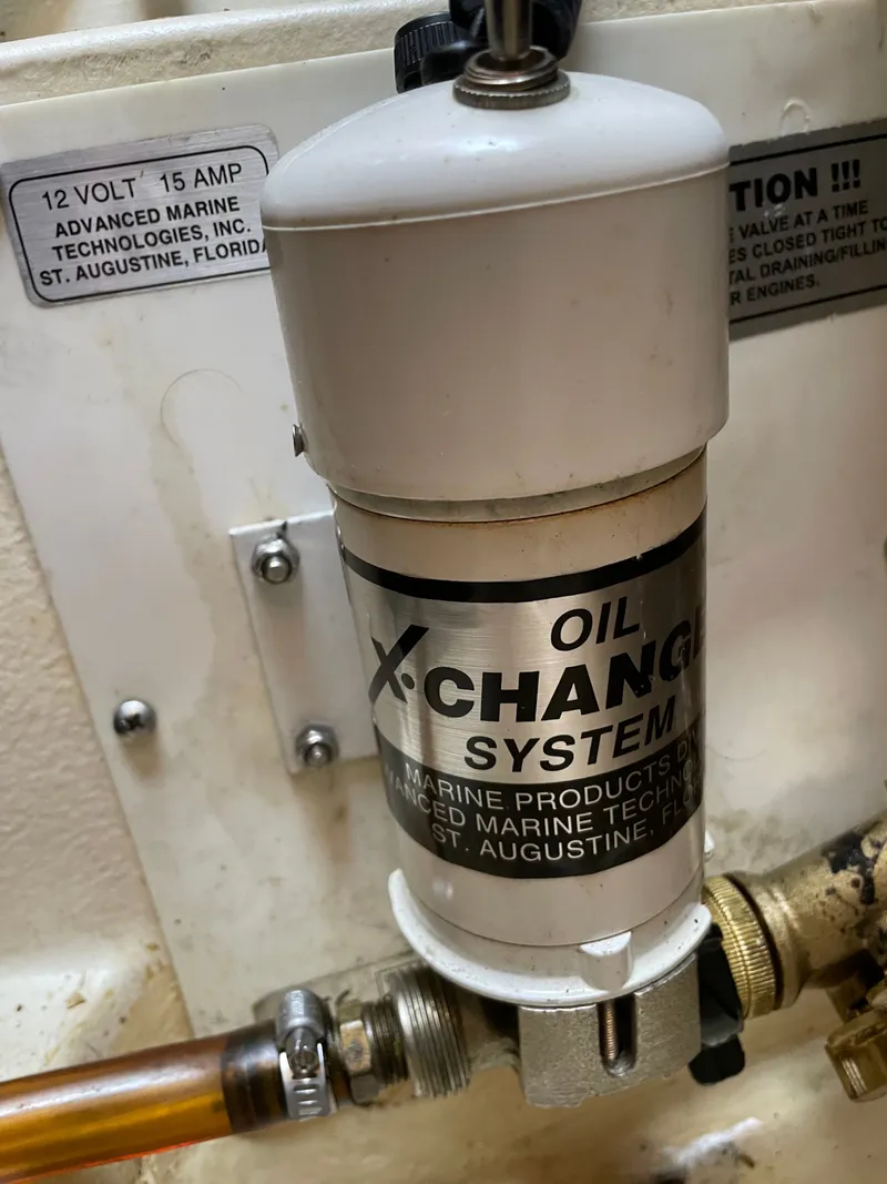 Slide: The Image of Oil change system in a 2007 Hunter 41 boat. - 47