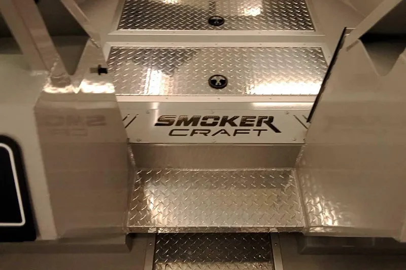 Slide: The Image of 2026 Smoker Craft Phantom 20 X2 Offshore boat with metallic steps and logo. - 10