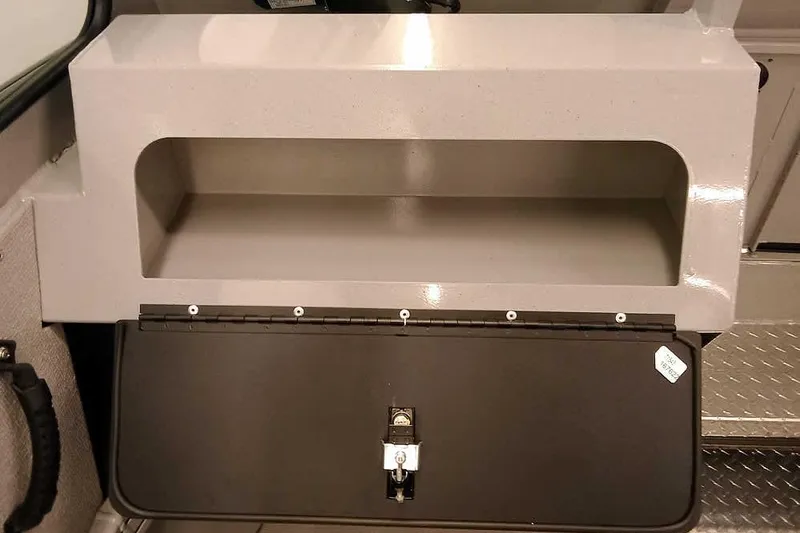 Slide: The Image of Storage compartment in 2026 Smoker Craft Phantom 20 X2 Offshore boat interior. - 17