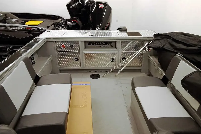 Slide: The Image of 2026 Smoker Craft Phantom 20 X2 Offshore boat interior with seating and storage compartments. - 25