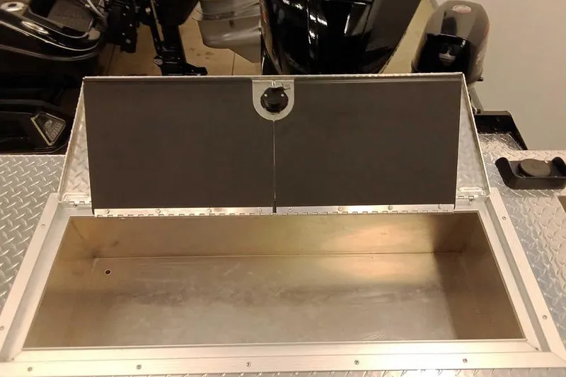 Slide: The Image of Open storage compartment on 2026 Smoker Craft Phantom 20 X2 Offshore boat. - 29