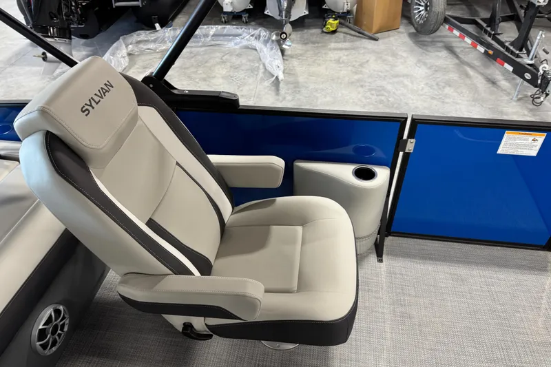Slide: The Image of Luxurious Sylvan X 5 2026 boat seat with armrests and cup holder. - 10