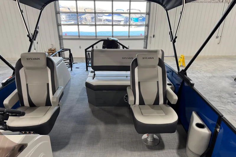 Slide: The Image of 2026 Sylvan X 5 boat interior with modern seating and sleek design. - 15