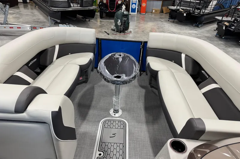 Slide: The Image of Luxurious interior of 2026 Sylvan X 5 boat with plush seating and modern design. - 9