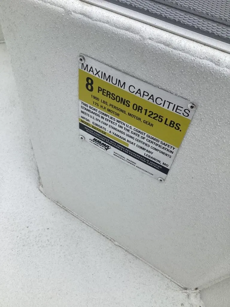 Slide: The Image of Capacity sign for 8 persons or 1225 lbs on G3 Bay 21 GX. - 16