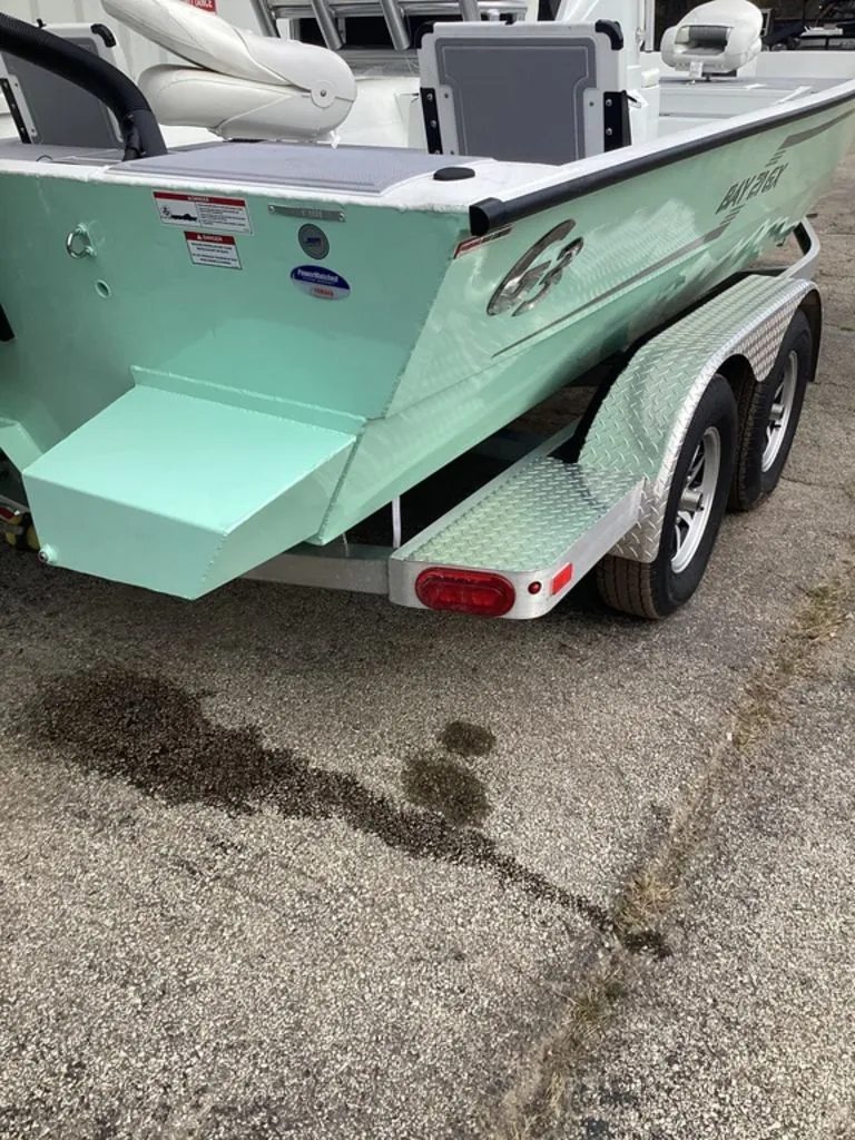 Slide: The Image of G3 Bay 21 GX boat on trailer, rear view, 2025 model. - 37