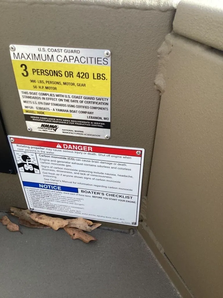 Slide: The Image of Safety and capacity labels on a 2026 G3 Gator Tough 16 DK boat. - 19