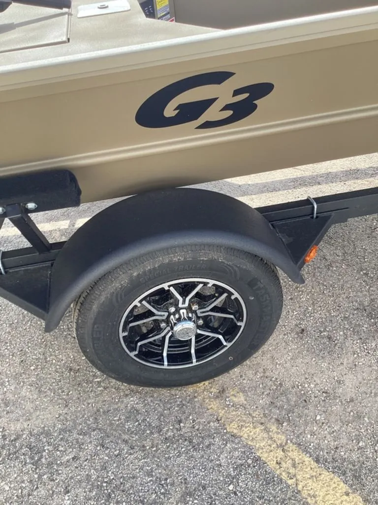 Slide: The Image of G3 Gator Tough 16 DK boat trailer, wheel view, 2026 model. - 5