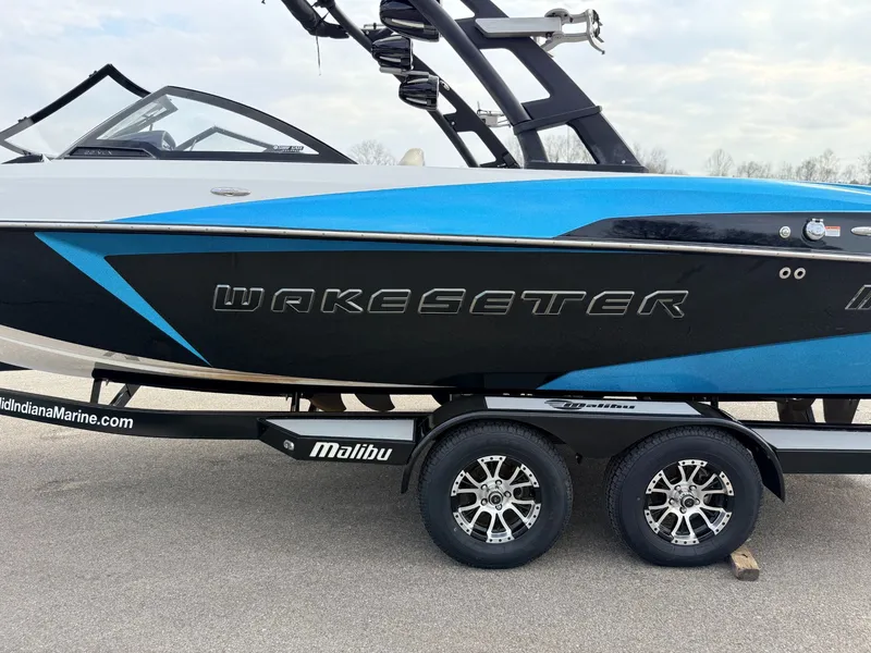 Slide: The Image of 2016 Malibu Wakesetter 22 VLX boat on trailer. - 16