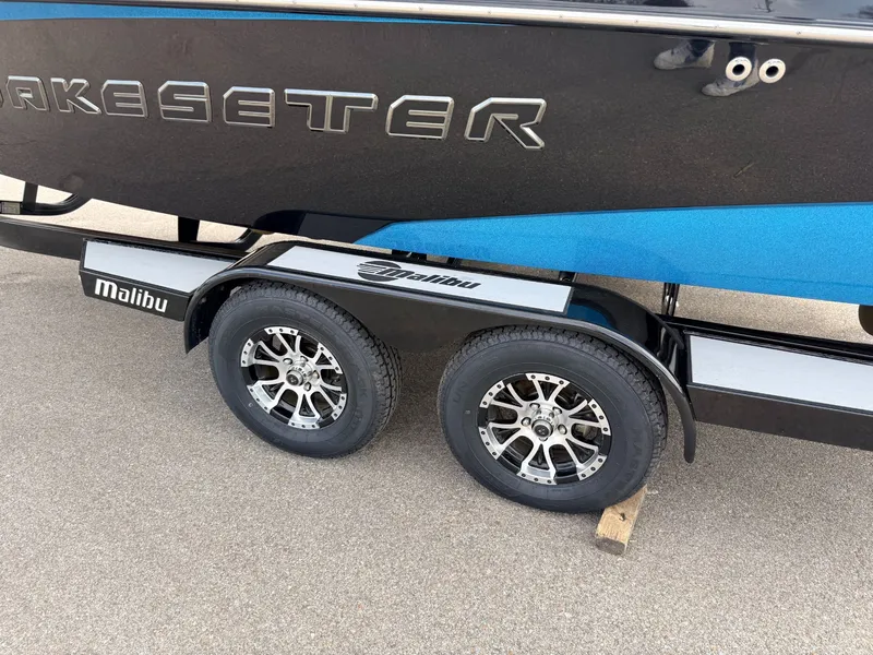 Slide: The Image of 2016 Malibu Wakesetter 22 VLX boat on trailer. - 17